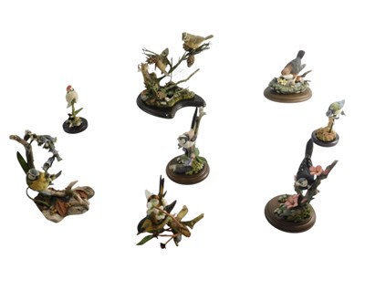 Lot 414 - Eight Country Artist bird figure...