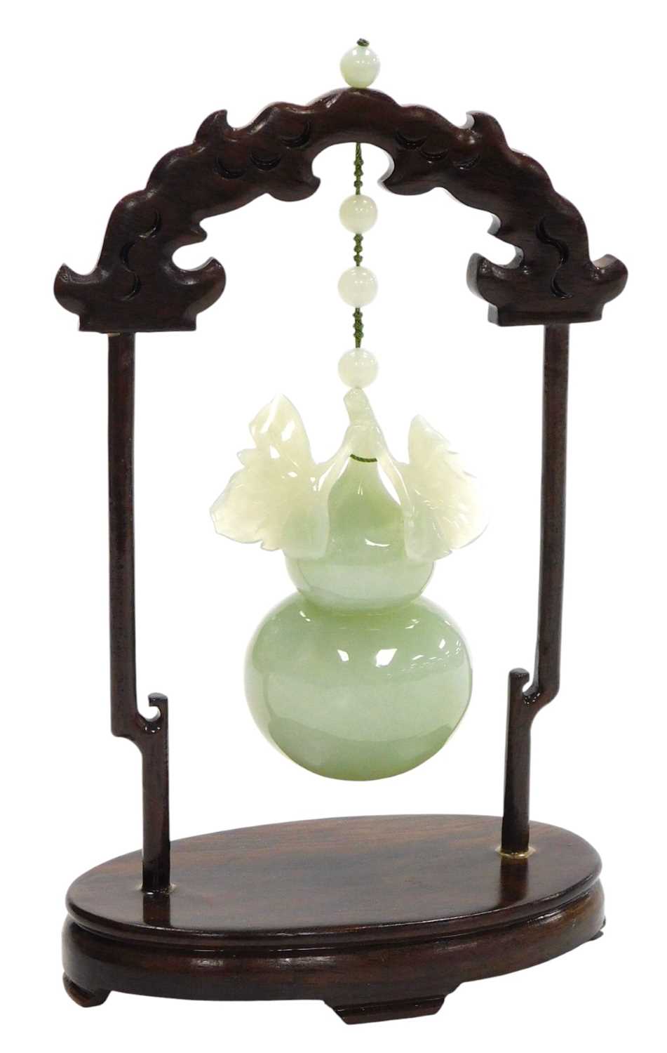 Lot 31 - A 20thC Chinese jade carving of a gourd, with...