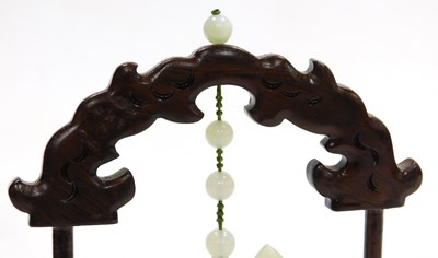 Lot 31 - A 20thC Chinese jade carving of a gourd, with...