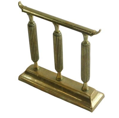 Lot 481 - A brass fire iron stand, on a rectangular base,...