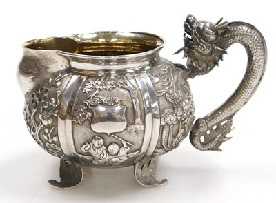 Lot 9 - A late 19thC Chinese silver cream jug and...