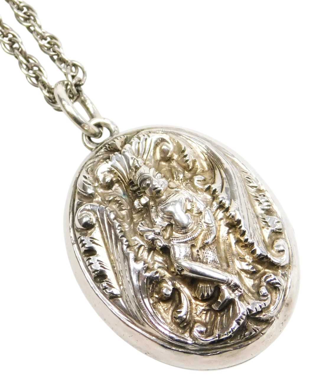 Lot 41 - A late 19thC Anglo-Indian double photo locket,...