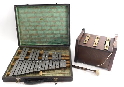 Lot 494 - Two xylophones, comprising a 20thC oak cased...
