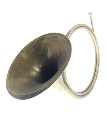 Lot 505 - A 20thC brass French horn, 69cm wide.