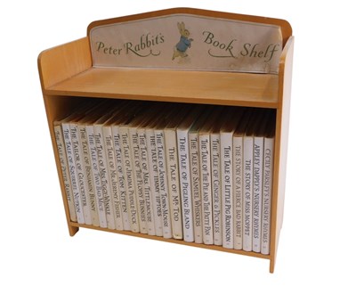 Lot 528 - Beatrix Potter Tale of Peter Rabbit bookcase...