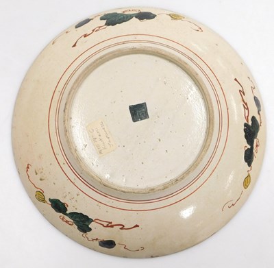 Lot 25 - A Japanese Meiji period Kutani dish, decorated...