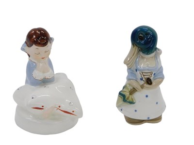 Lot 608 - A Royal Dux figure of a young girl praying...