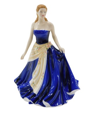 Lot 637 - A Royal Doulton porcelain figurine, Olivia,...