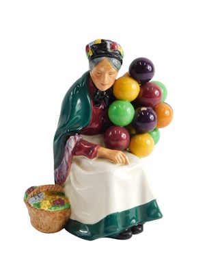 Lot 649 - A Royal Doulton porcelain figure, Old Balloon...