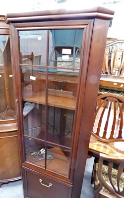 Lot 1537 - A standing corner cabinet, with glazed front...
