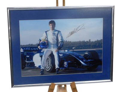 Lot 24 - Motor Racing - A framed signed colour...