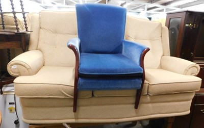 Lot 1628 - A Parker Knoll cream upholstered three seater...