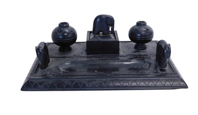 Lot 743 - A 20thC ebonised desk stand, with arched...