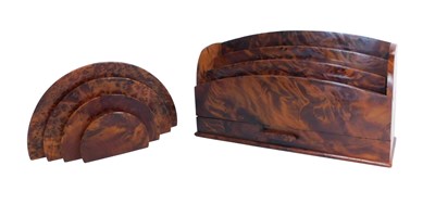 Lot 715 - Two yew letter racks, one of four layered dome...
