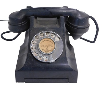 Lot 716 - A black bakelite telephone, model 4509D.