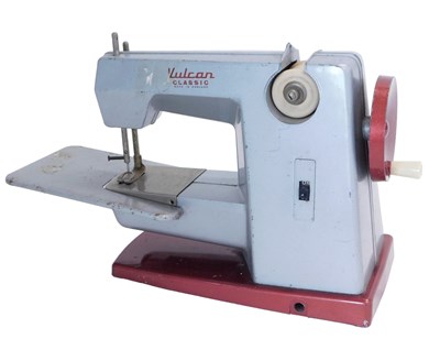 Lot 722 - A Vulcan classic miniature sewing machine.