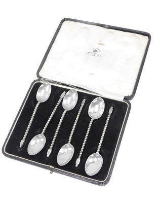 Lot 751 - A set of six George V silver teaspoons, each...