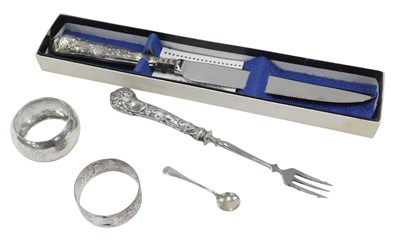Lot 776 - Two silver napkin rings, a small salt spoon, 1....