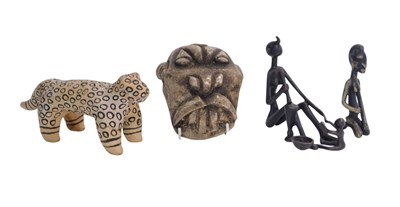 Lot 794 - A Nigerian carved tribal bone fetish head,...