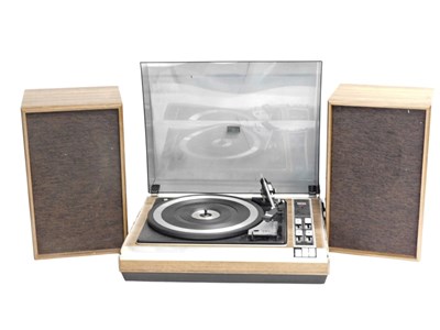 Lot 826 - An ITT gramophone with speakers.  WARNING!...