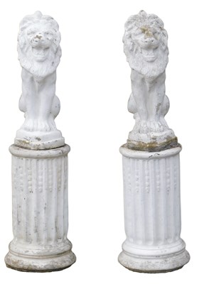 Lot 852 - A pair of painted composition lions, each...
