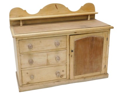 Lot 873 - A Lincolnshire stripped pine dresser, with...