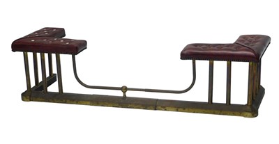 Lot 902 - An early 20thC brass and red leatherette club...