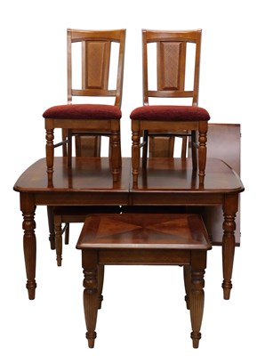 Lot 934 - A Continental walnut extending dining...
