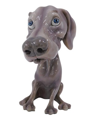 Lot 621 - A resin Little Paws figure of a dog, possibly...