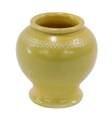Lot 622 - A yellow glazed ceramic baluster shaped vase,...