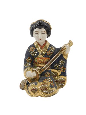 Lot 641 - A Japanese Earthenware Satsuma type figure of...