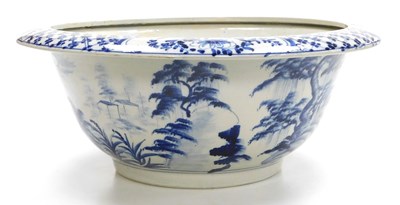 Lot 11 - A Qing dynasty style blue and white porcelain...