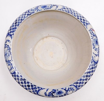Lot 11 - A Qing dynasty style blue and white porcelain...