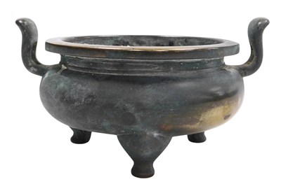 Lot 36 - A Chinese bronze censer, of twin handled,...