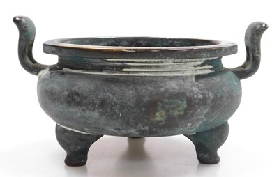 Lot 36 - A Chinese bronze censer, of twin handled,...