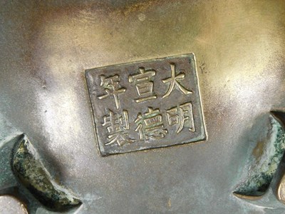 Lot 36 - A Chinese bronze censer, of twin handled,...