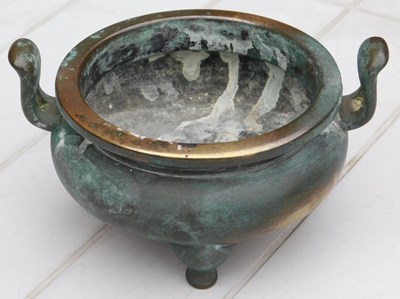 Lot 36 - A Chinese bronze censer, of twin handled,...