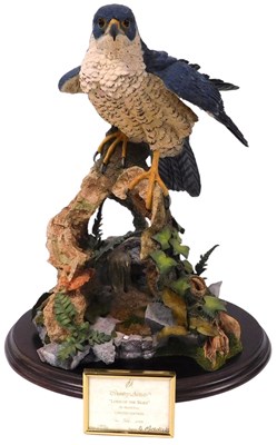 Lot 27 - A Country Artists figure of a Peregrine Falcon...