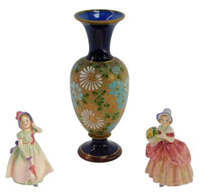 Lot 34 - Two Royal Doulton porcelain figures, modelled...