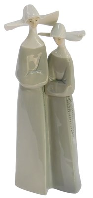 Lot 35 - A Lladro porcelain figure group, modelled as...