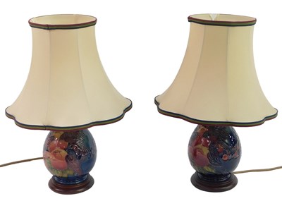 Lot 1 - A pair of Moorcroft pottery Finches pattern...