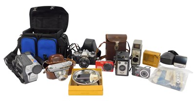 Lot 82 - A group of cameras and optical related...