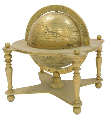 Lot 85 - A 20thC brass model of a globe on stand, 29cm...