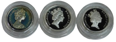 Lot 112 - Three The Royal Mint silver proof one pound...