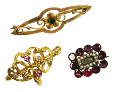 Lot 211 - A Victorian amethyst and seed pearl brooch, in...