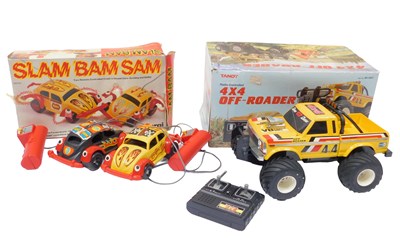 Lot 255 - A Tandy radio controlled 4x4 off roader, boxed,...