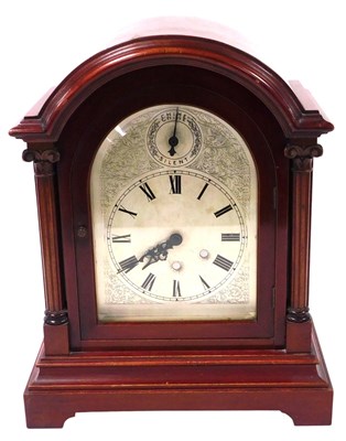 Lot 75 - An Edwardian mahogany cased mantel clock, with...