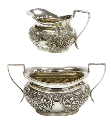 Lot 108 - An Edwardian silver cream jug and twin handled...