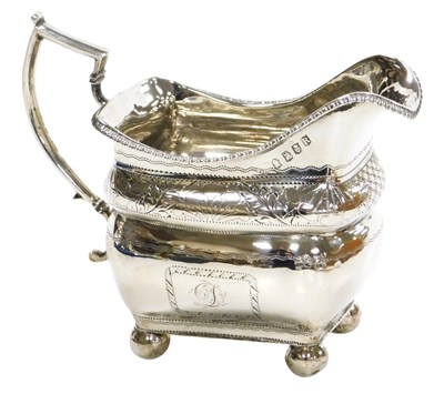 Lot 110 - A George III Irish silver cream jug, of ogee...