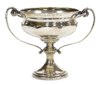Lot 116 - An Edward VIII silver twin handled golfing...